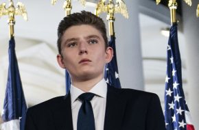 FILE - Barron Trump stands on the South Lawn of the White House on the fourth day of the Republican National Convention in Washington, Aug. 27, 2020. (AP Photo/Evan Vucci, File)